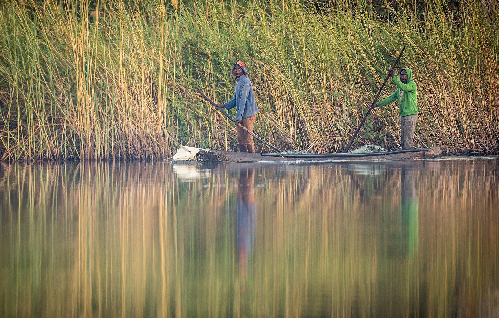 Fisherman Chobe River Namibia by Kevin Maitland